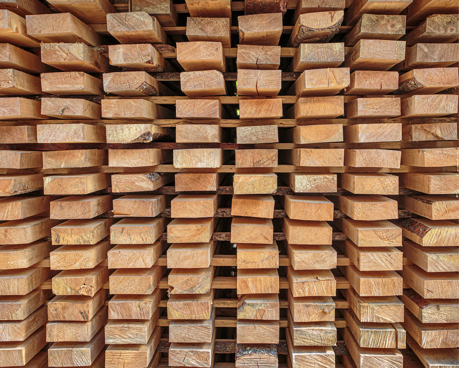 Stack of new wooden planks air drying at the lumber yard on July 10, 2018 in Kainuu, Finland.